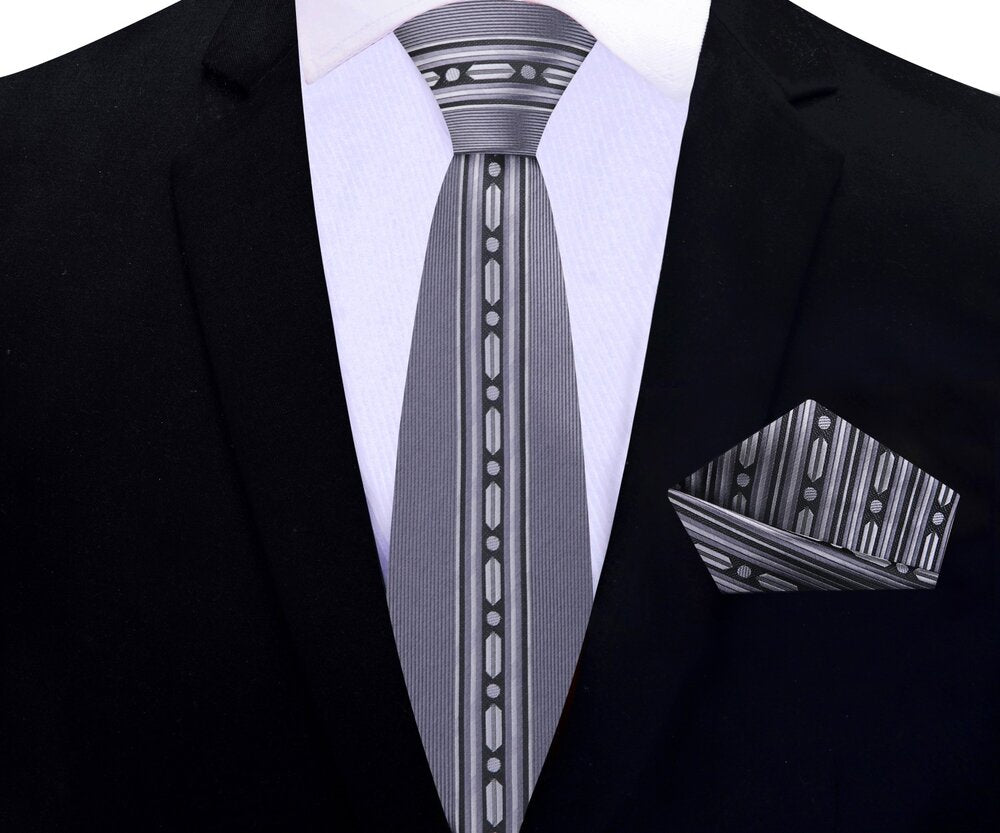 Pocket square and tie set displayed flat—highlighting the elegant silk texture and abstract design.