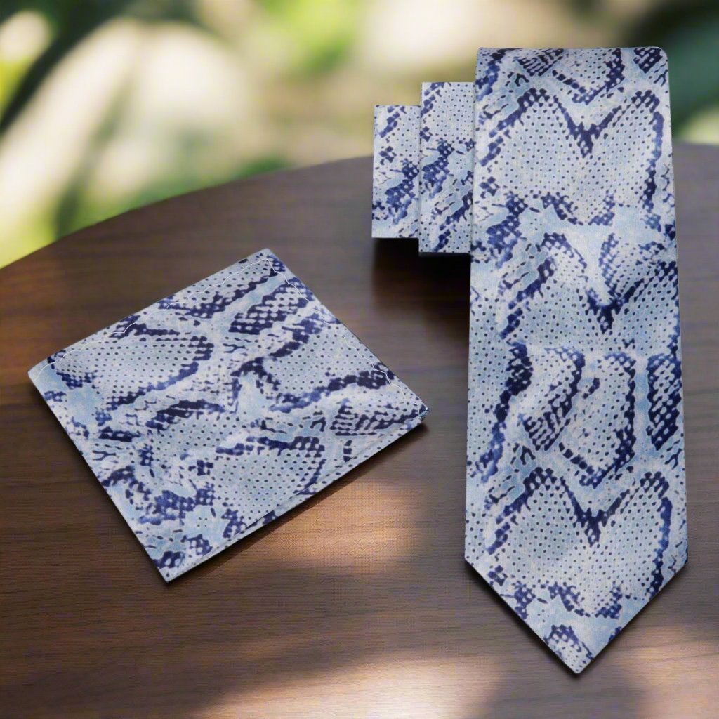 Elegant grey snakeskin necktie displayed against a white background, showcasing its intricate pattern.