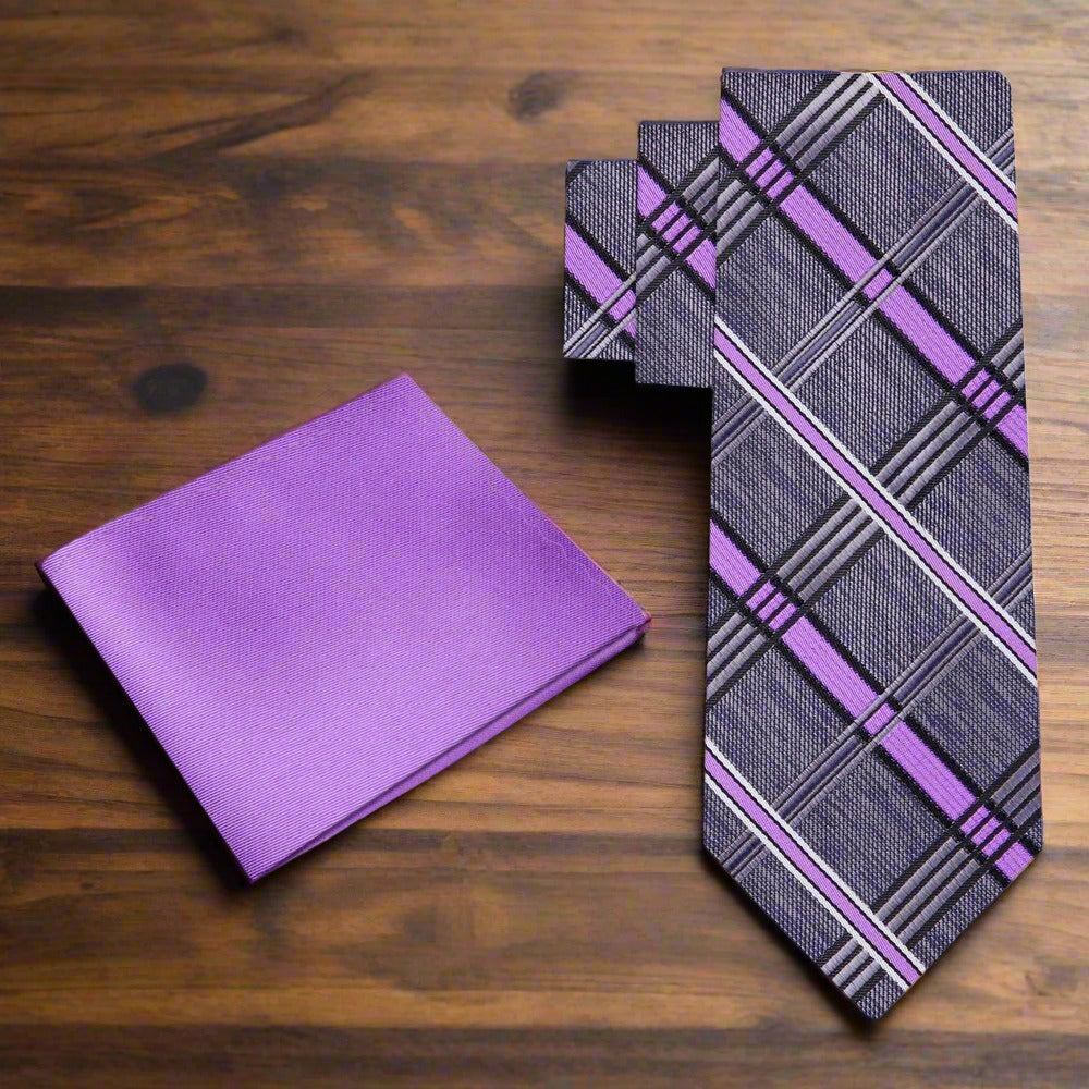 The necktie styled with a light blue dress shirt for a complete look.