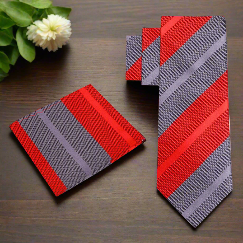Elegant Pink and Grey Striped Silk Necktie displayed on a crisp white shirt.