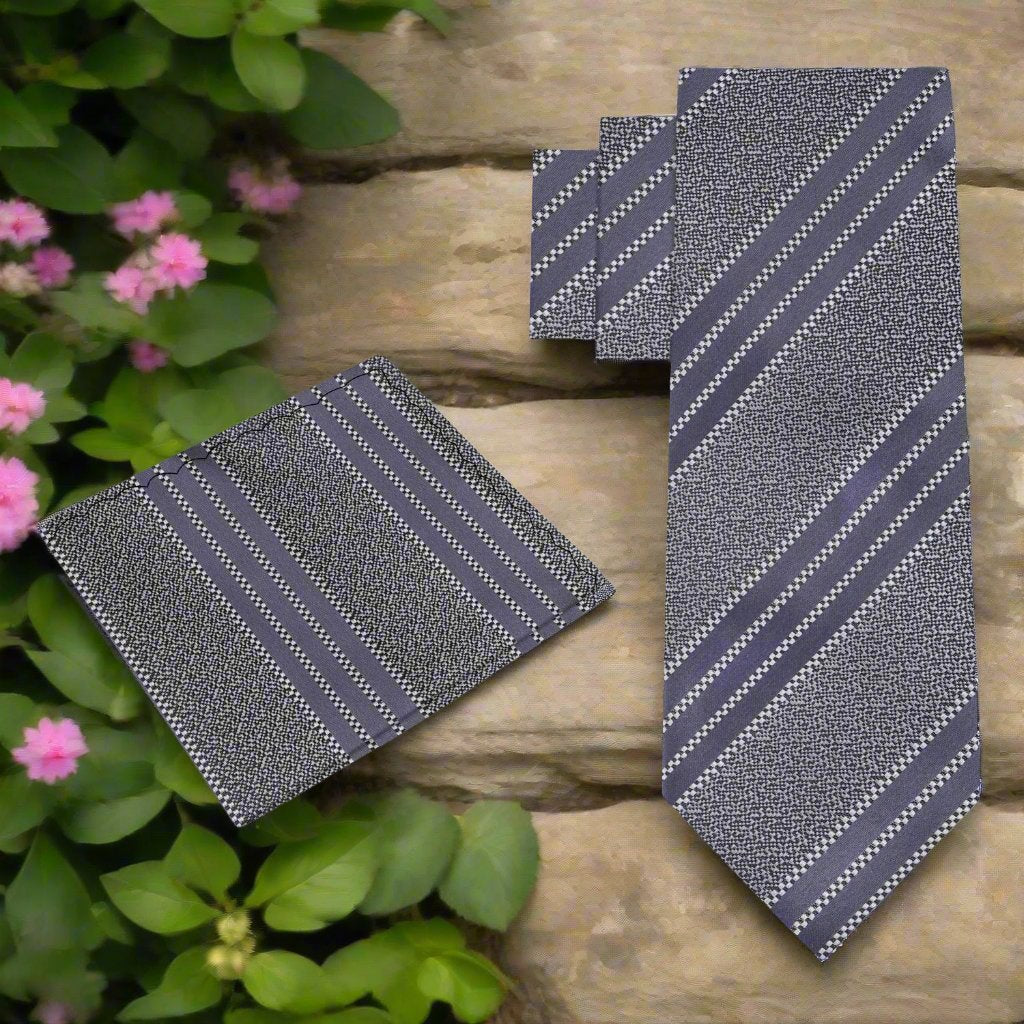 Stylish necktie paired with a charcoal grey suit, highlighting its versatility for formal occasions.