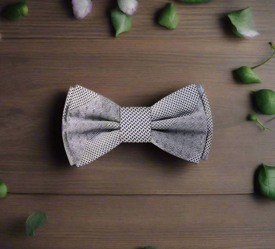 Man wearing a red silk bow tie with a white dress shirt at a wedding