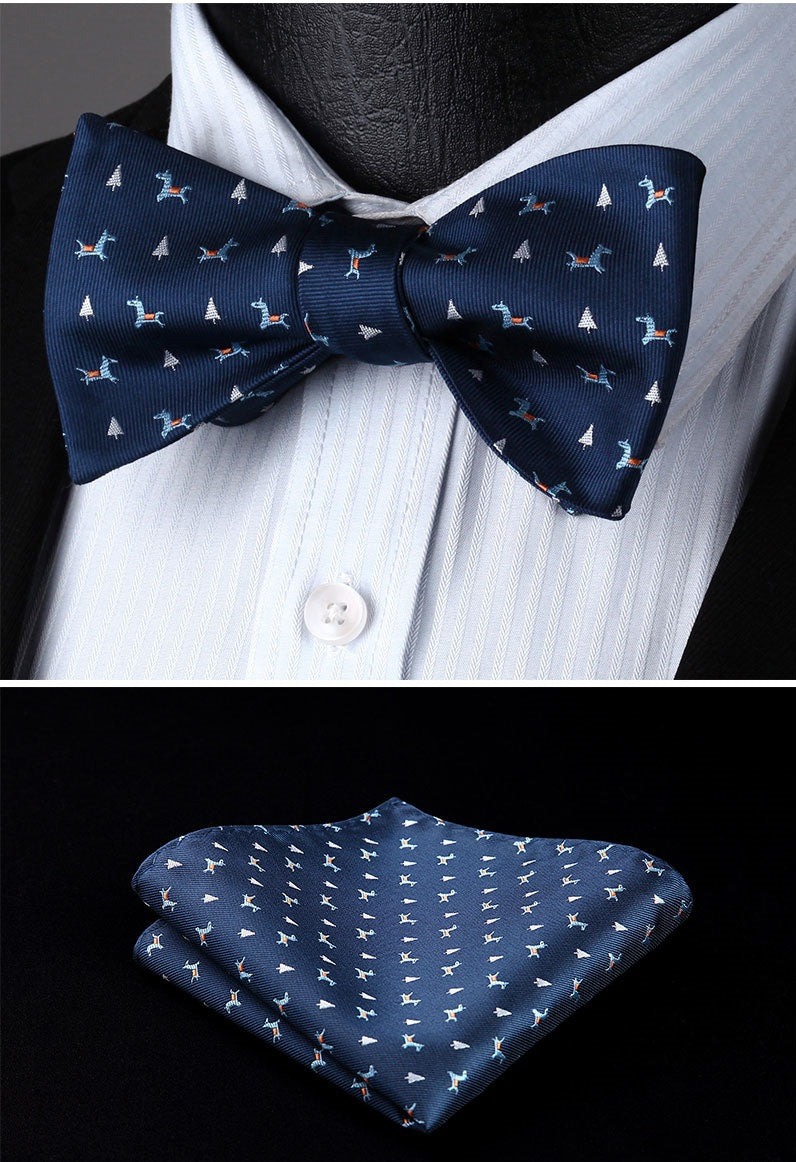 Close-up of silk self tie bow tie with reindeer pattern, ideal for holiday events