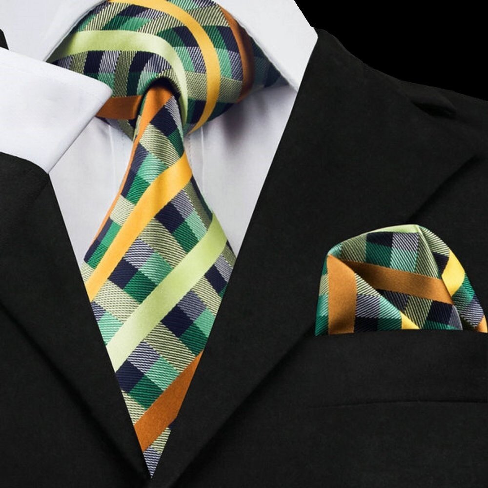 Child wearing green plaid silk kids necktie and pocket square at a wedding
