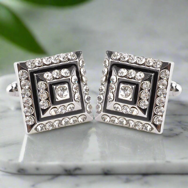 Elegant pyramid diamond cufflinks showcasing a sleek design from above.