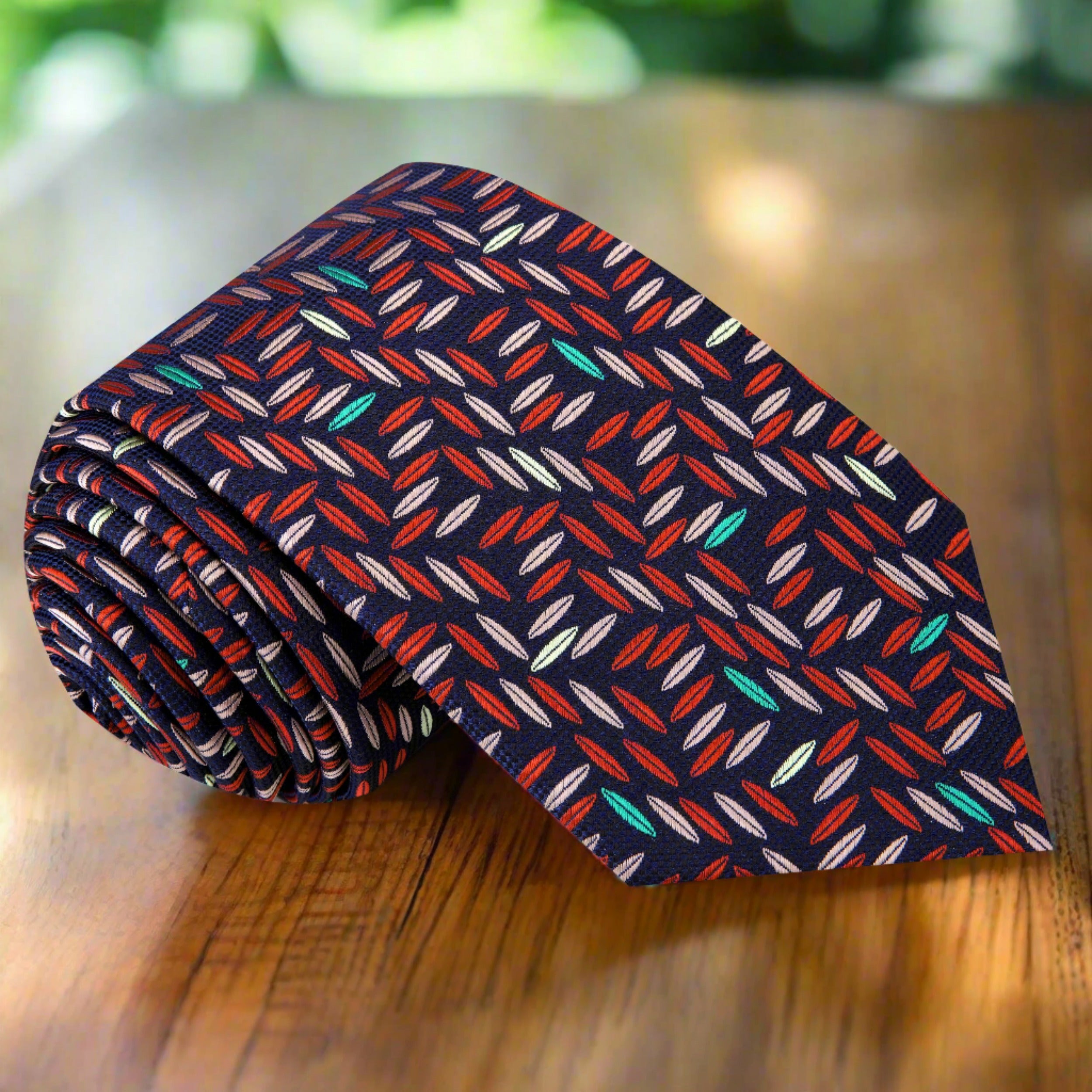 Close-up of the Geometric Elegance silk necktie showcasing intricate patterns.