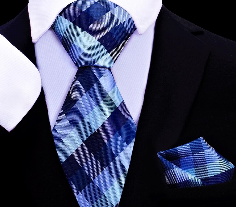 Front view of boys silk tie and childrens pocket square in bluebird pattern, laid flat