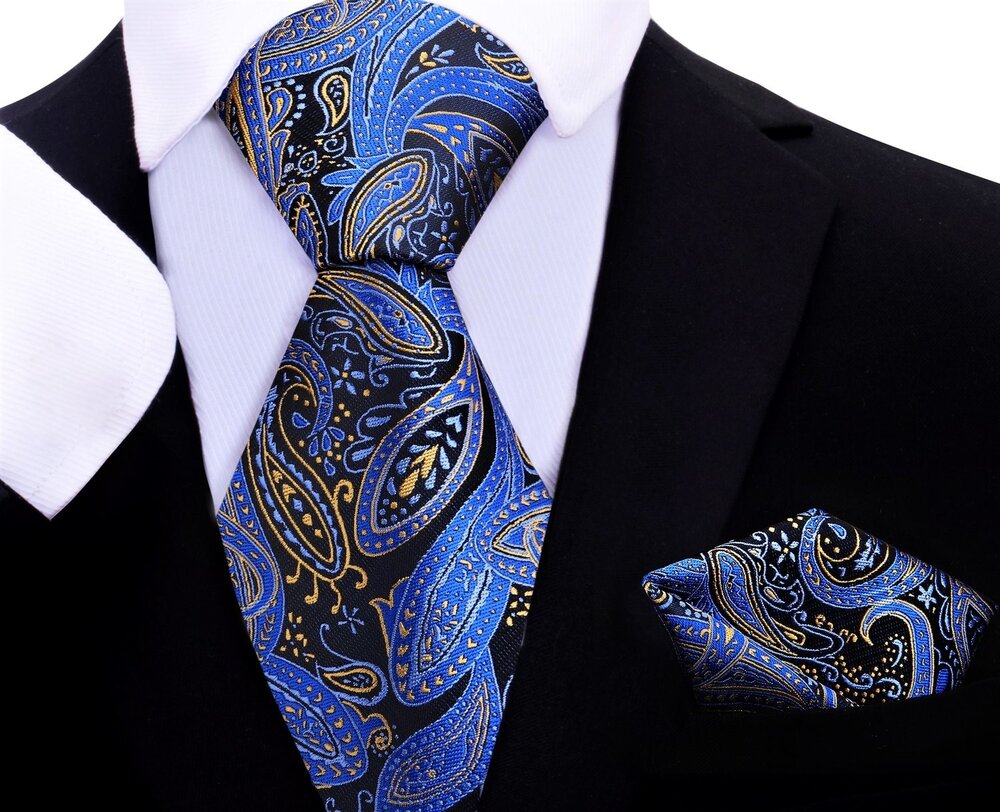 Close-up of black silk tie paired with a gold pocket square for kids
