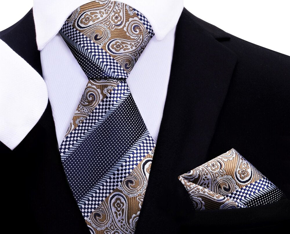 Close-up of the charming blue and brown check necktie and silk pocket square set, showcasing the paisley details.