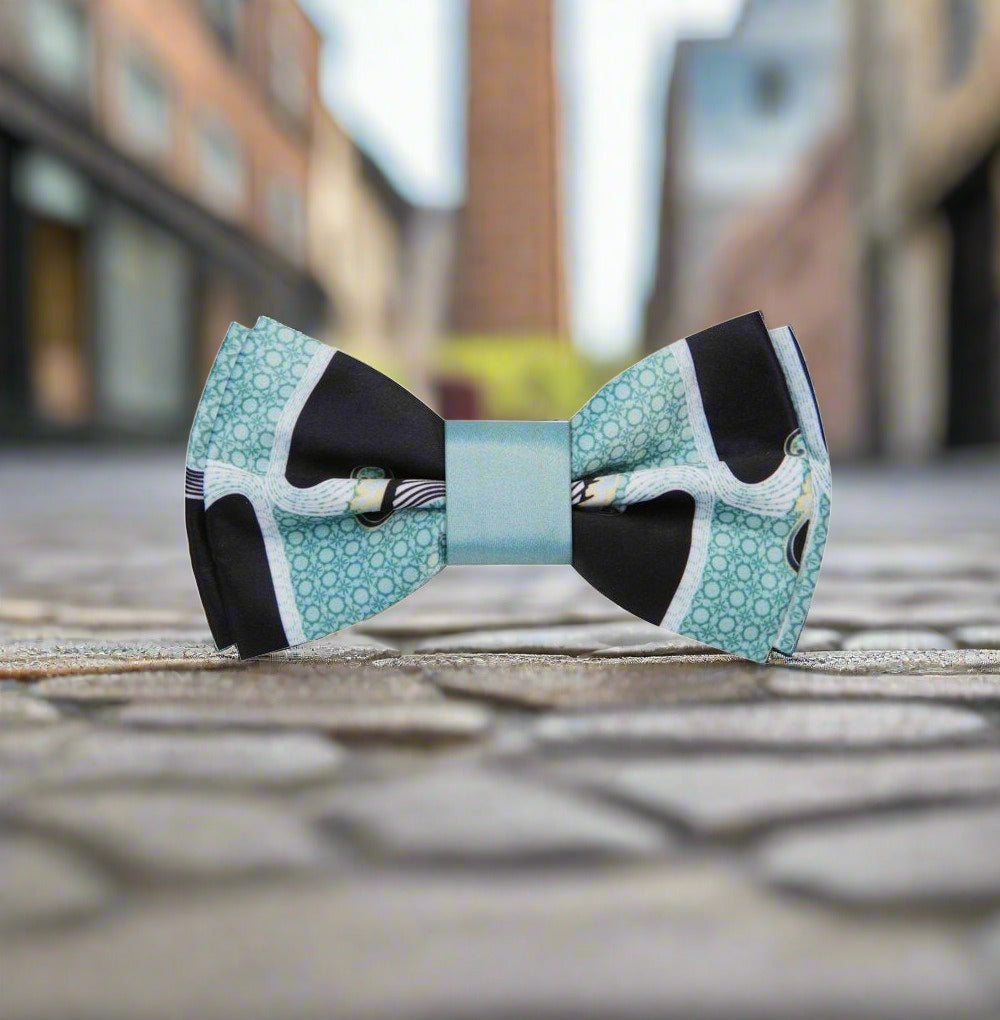 Model wearing a silk bow tie with wavy pattern at a wedding reception