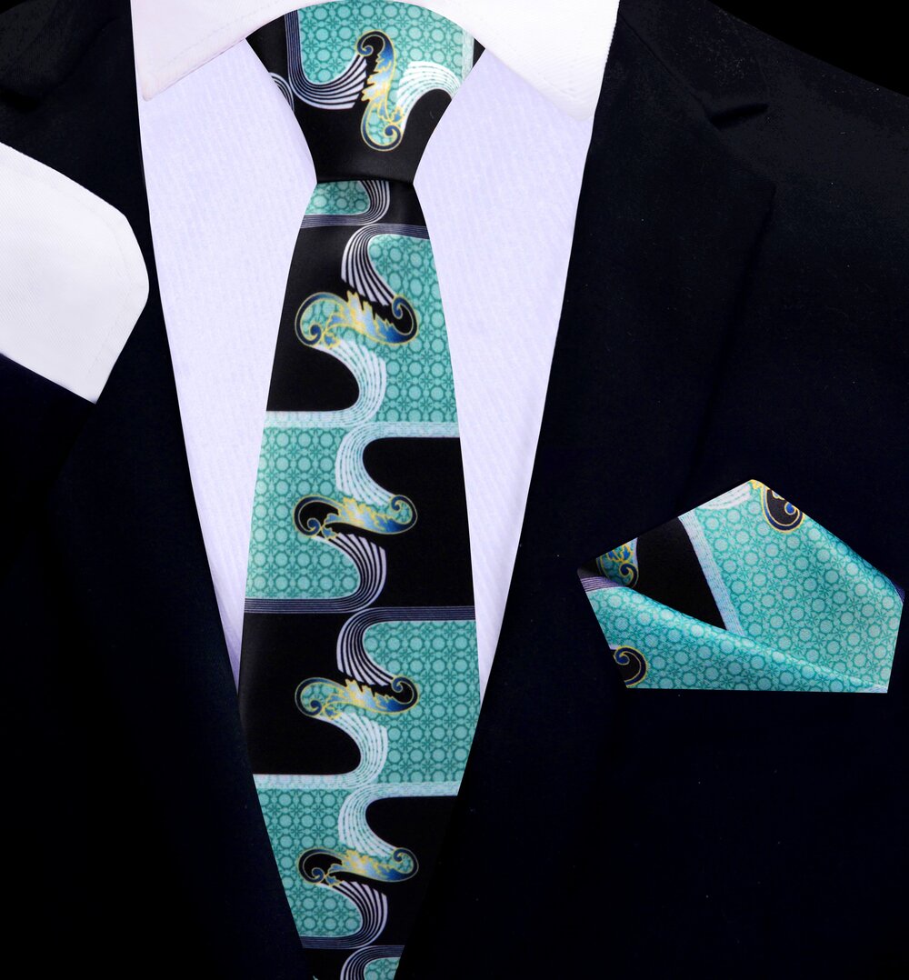 Close-up of the red and black wavy necktie laid flat, showing the bold center pattern