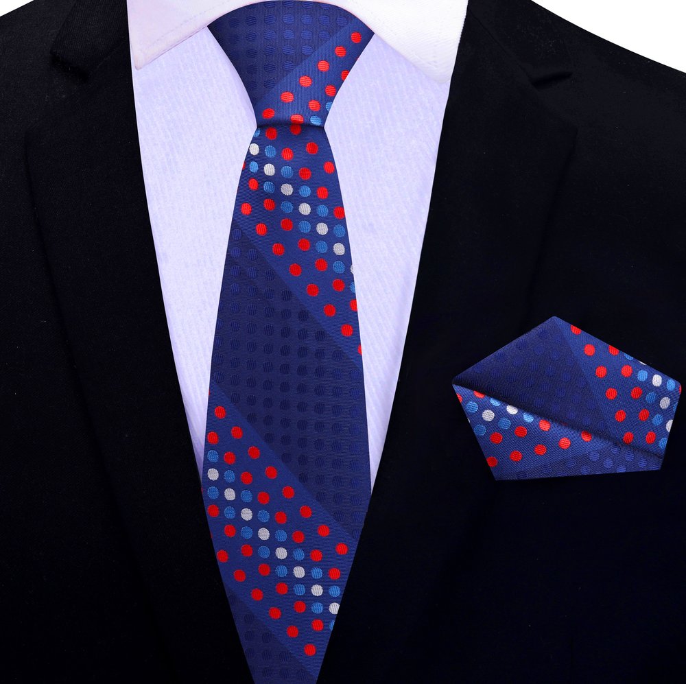 Front view of stylish polka dot silk tie in red and blue for men