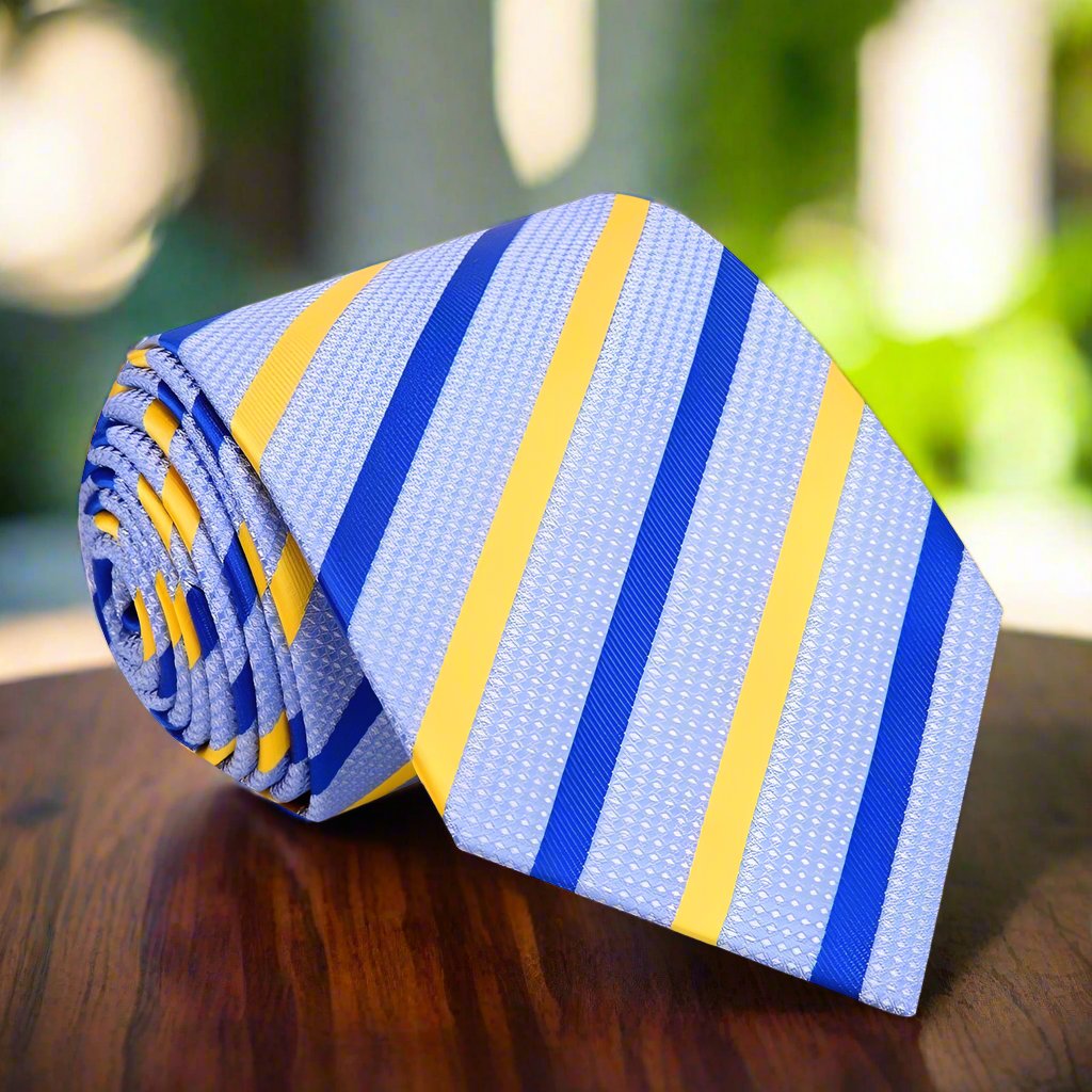 Light blue striped silk tie displayed on a wooden table, ideal for weddings and business meetings.