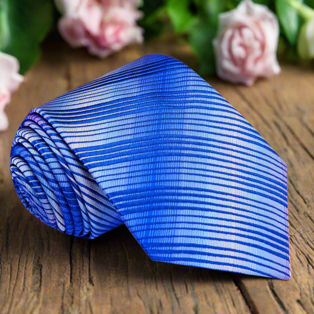 Elegant silk necktie featuring blue and purple wavy lines, ideal for formal wear