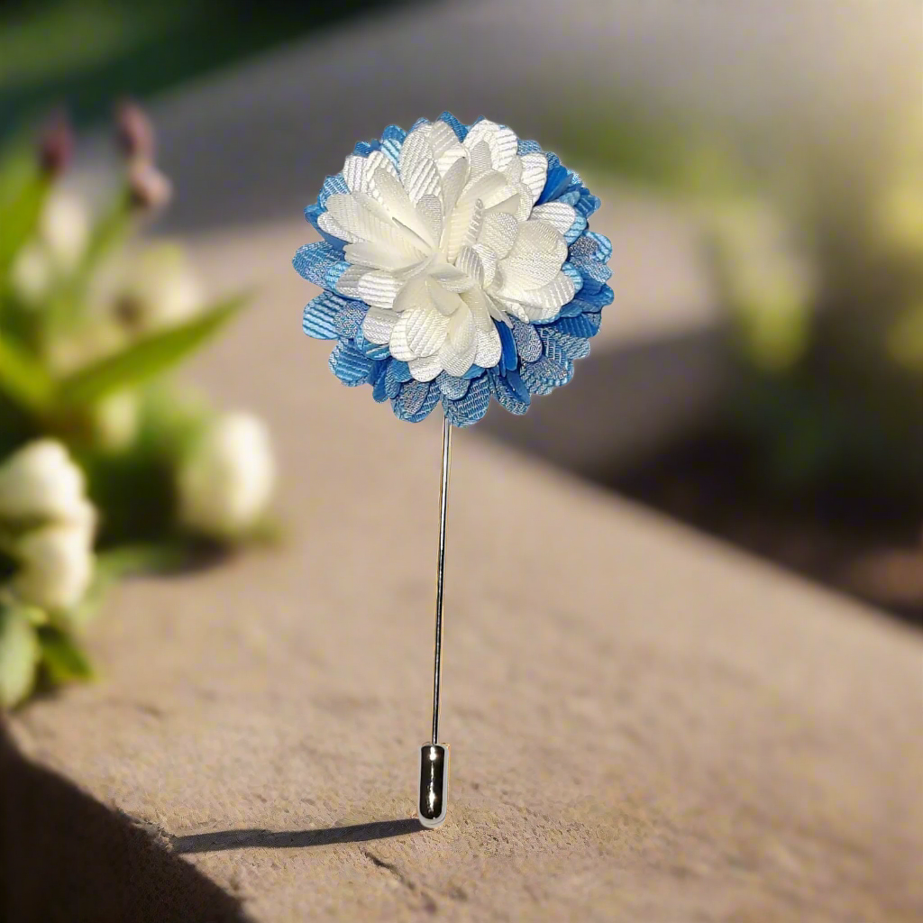 Elegant flower lapel pin with detailed petals on a suit lapel