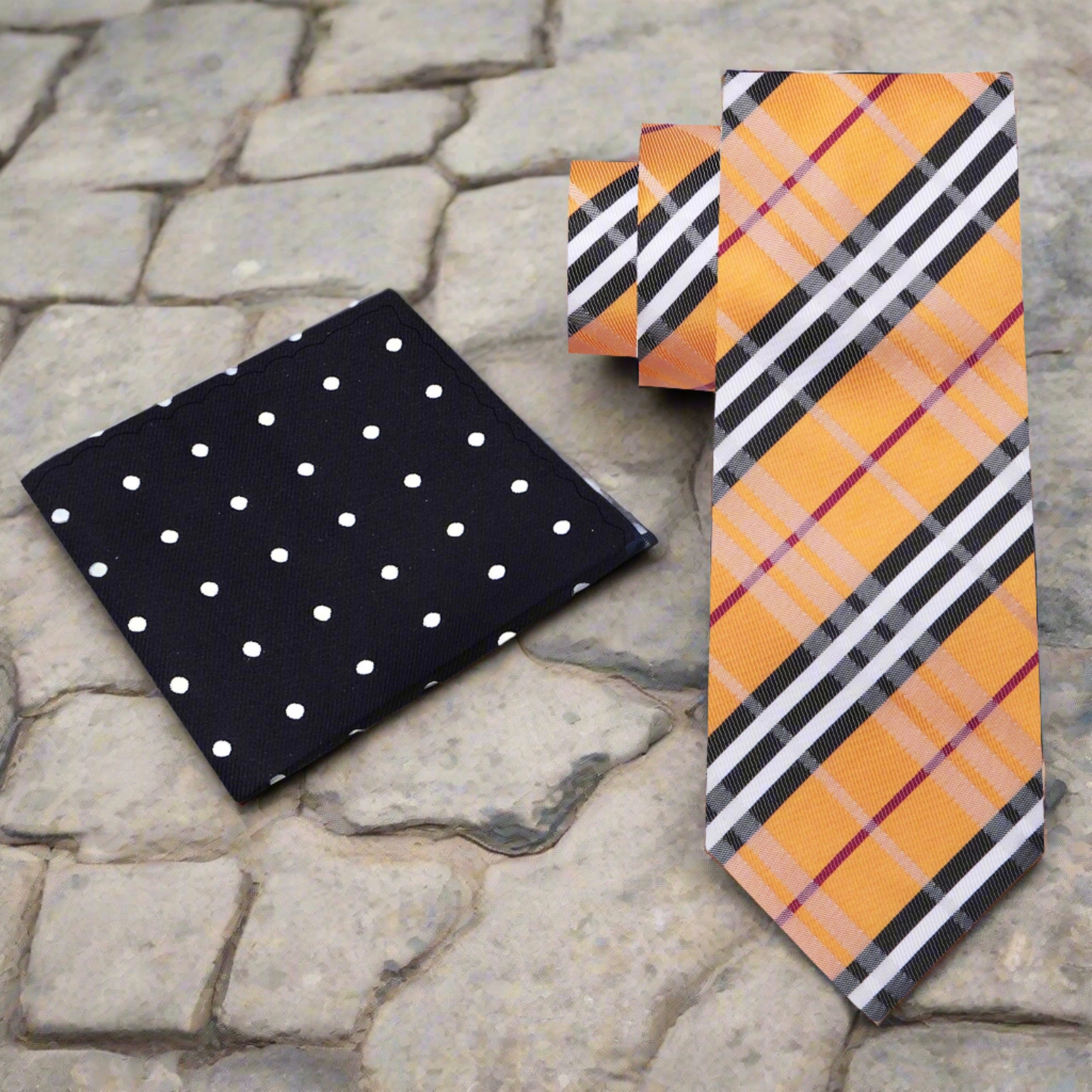 Close-up of the plaid silk necktie showcasing intricate pattern and rich colors