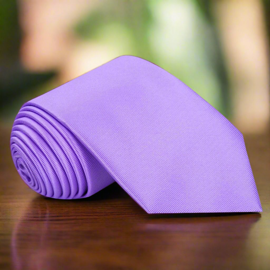 Close-up of a light purple silk tie with a smooth finish, ideal for weddings