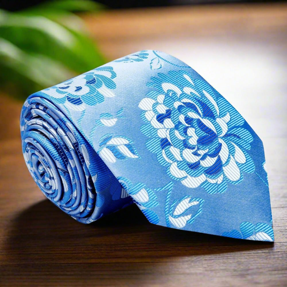 Close-up of silk tie with floral pattern and matching pocket square for formal wear
