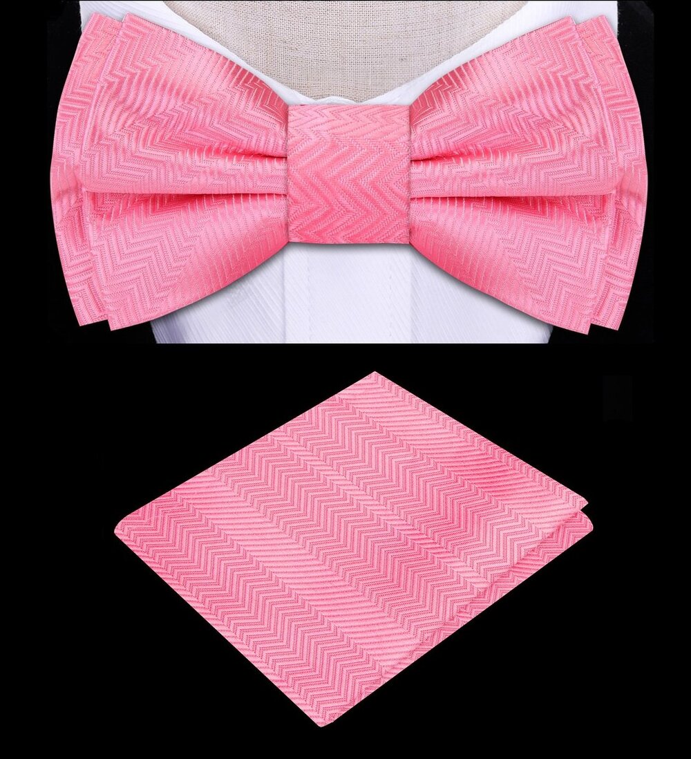 Kid wearing light pink bow tie and pocket square for formal event