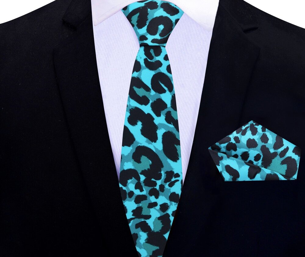 Cheetah print necktie paired with a classic white dress shirt and charcoal grey suit.