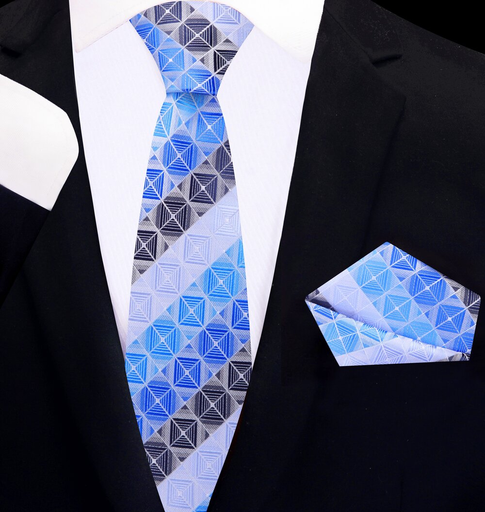 Man adjusting his silk necktie and pocket square set at a business conference, showcasing versatile formal neckwear.