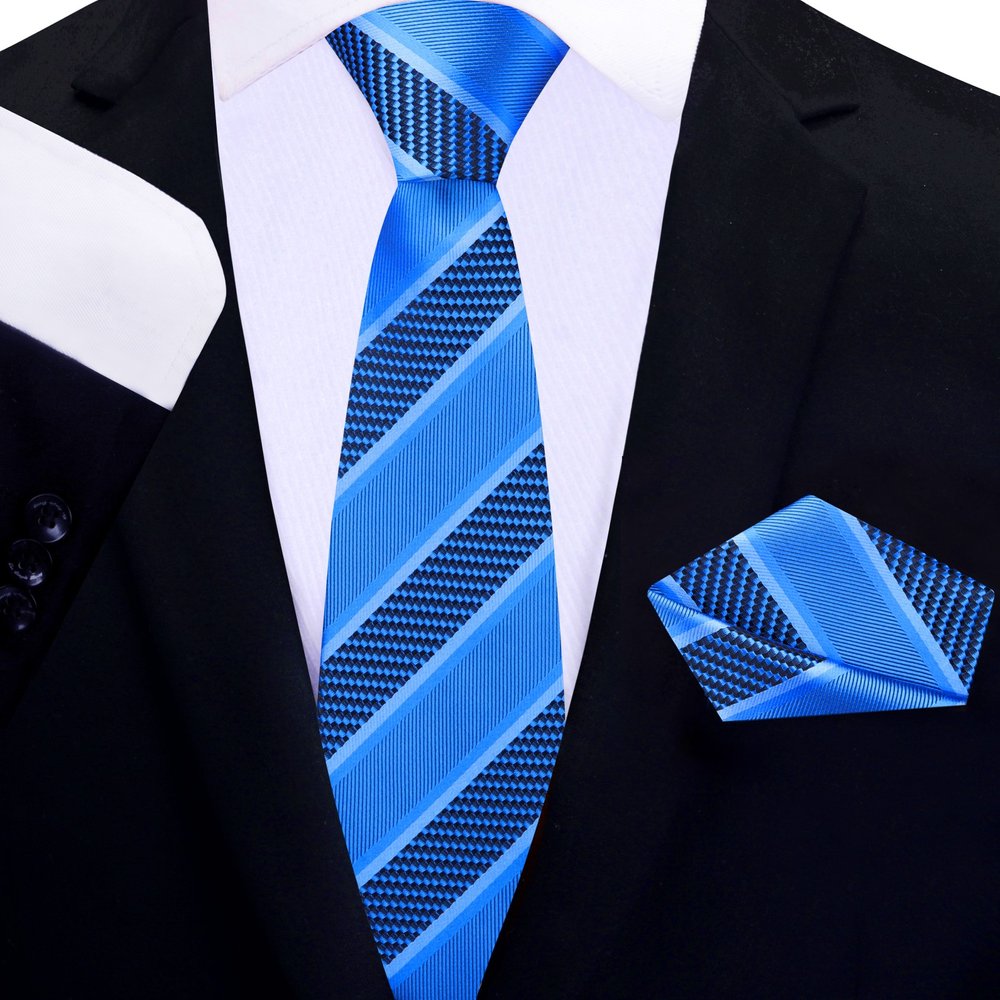 Close-up of classic striped silk necktie in blue and gold shades for business attire