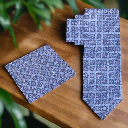 Man wearing silk necktie with geometric pattern at a wedding reception
