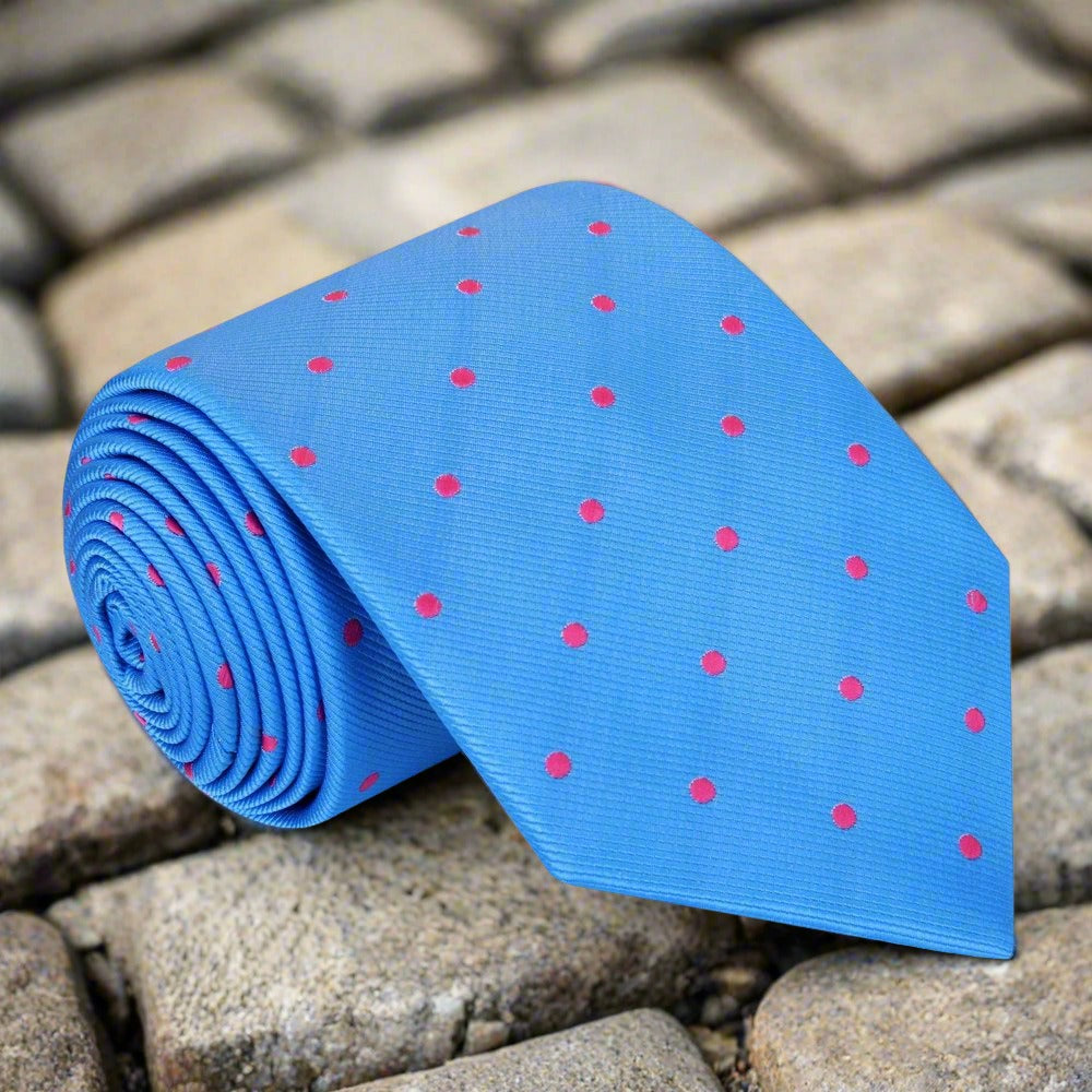 Close-up of green polka dot tie, showcasing its vibrant dots and silk texture.