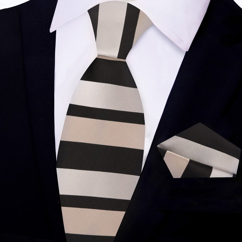 Close-up view of the elegant brown striped silk necktie, showcasing its premium texture and design.