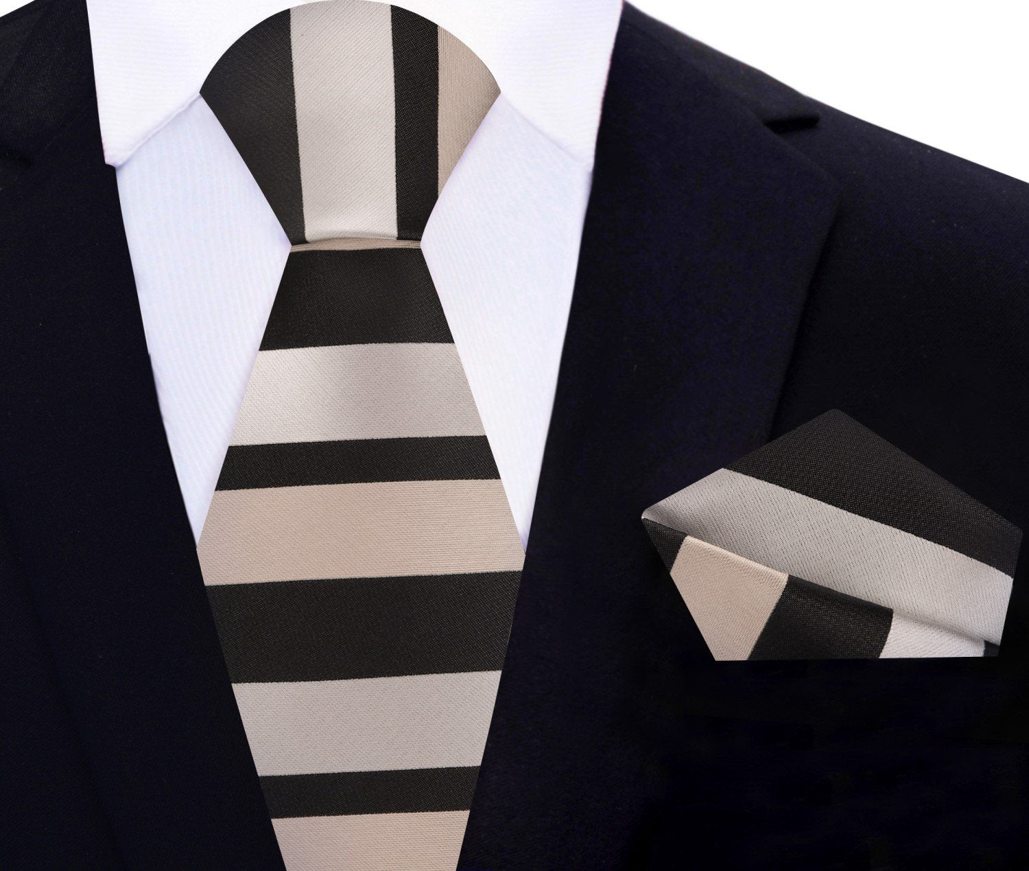 Model wearing the brown striped necktie paired with a navy suit at a wedding, demonstrating its versatility.