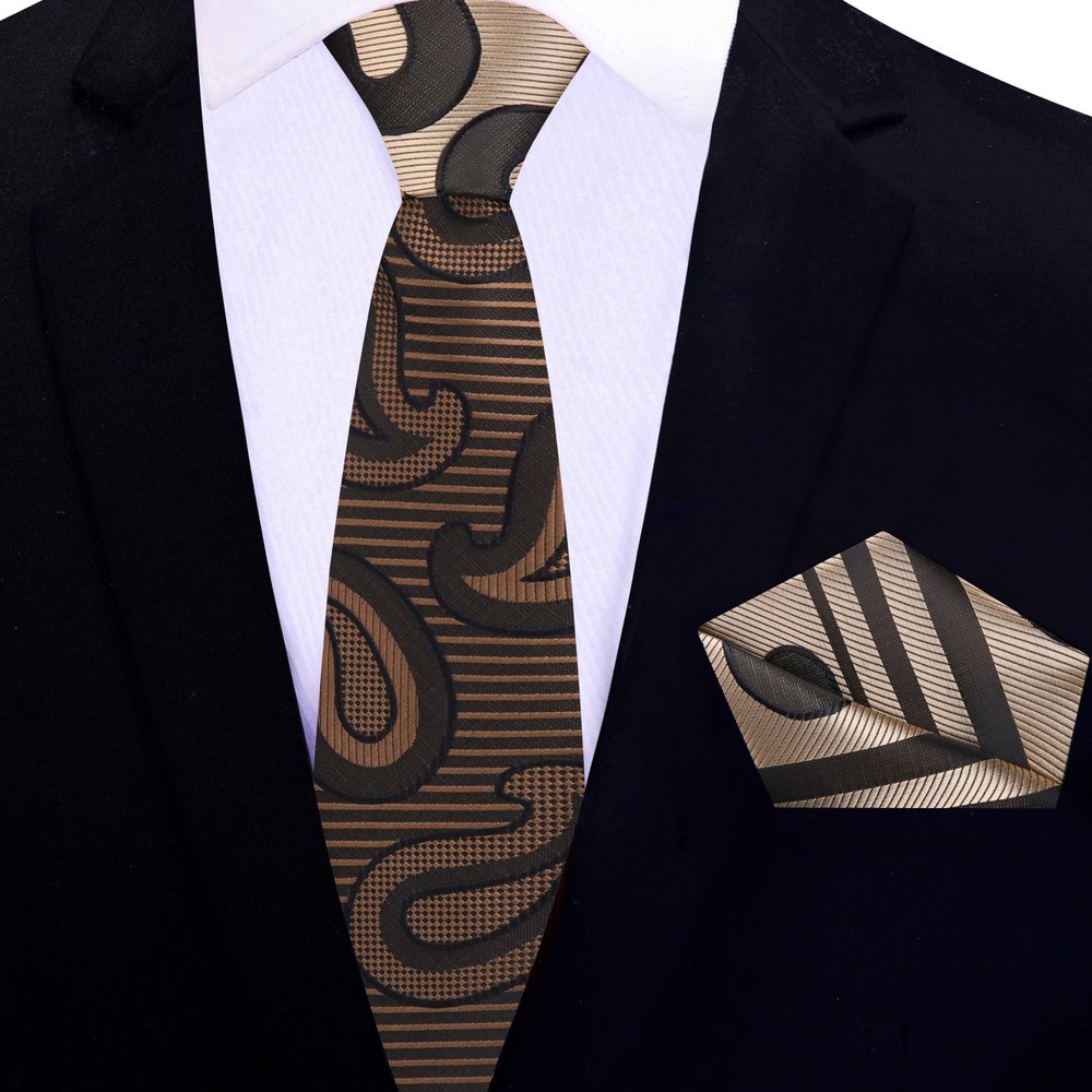 Silk tie with paisley design paired with a white dress shirt