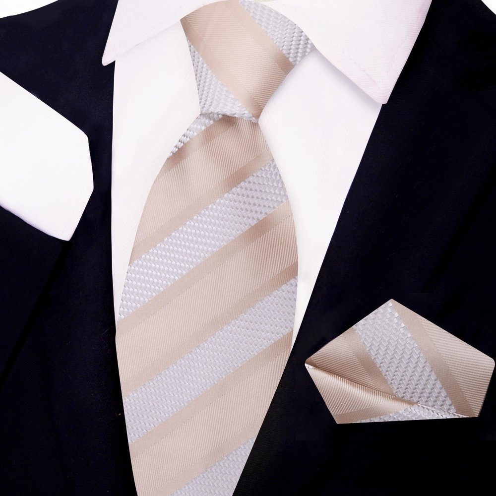 Close-up of classic striped silk necktie in blue and gold shades for business attire