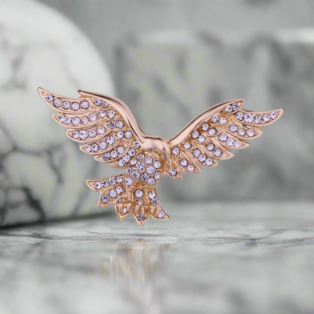 Close-up of a gemstone lion lapel pin with detailed craftsmanship