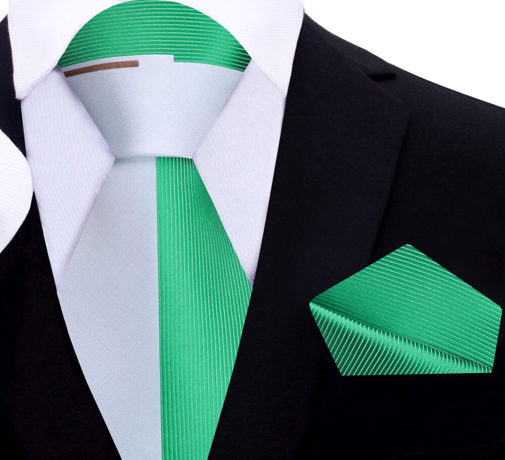 The two-toned silk necktie paired with a crisp white shirt, perfect for business.