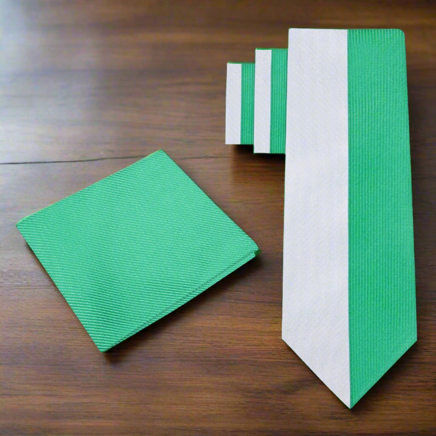 The necktie displayed against a charcoal grey suit, ideal for evening events.