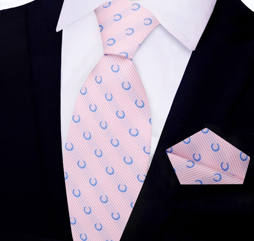 Men wearing silk necktie with horseshoe design at a social event