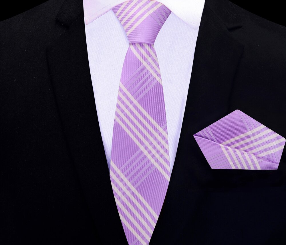 Graftenwell light purple plaid tie paired with a charcoal grey suit for formal events.