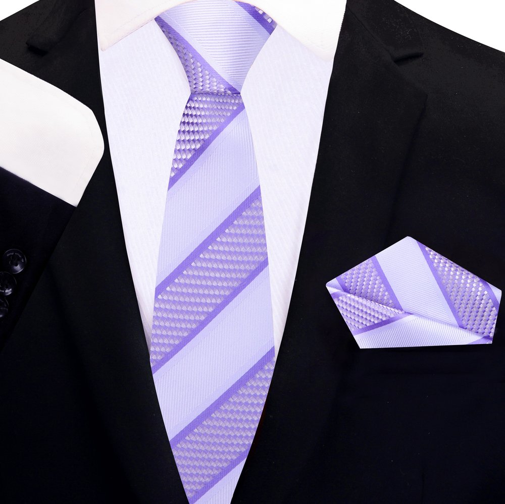 Man wearing a formal necktie for business meetings with a matching handkerchief