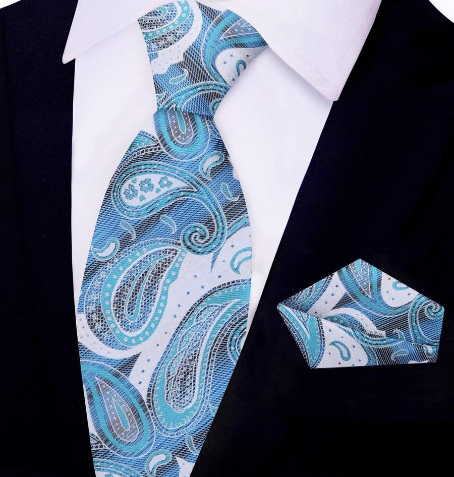 Men wearing the paisley tie with a navy suit at a networking event