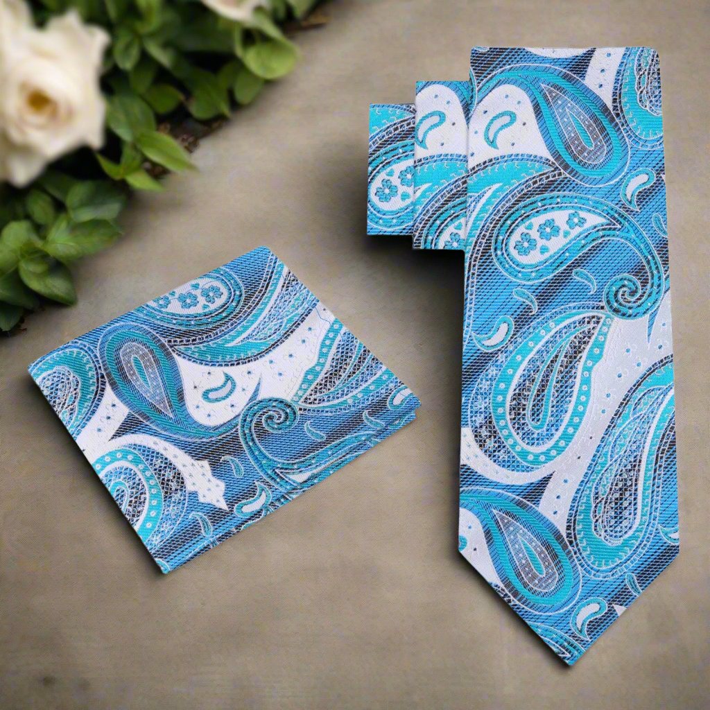 Silk necktie styled with a white dress shirt and gray suit for a wedding
