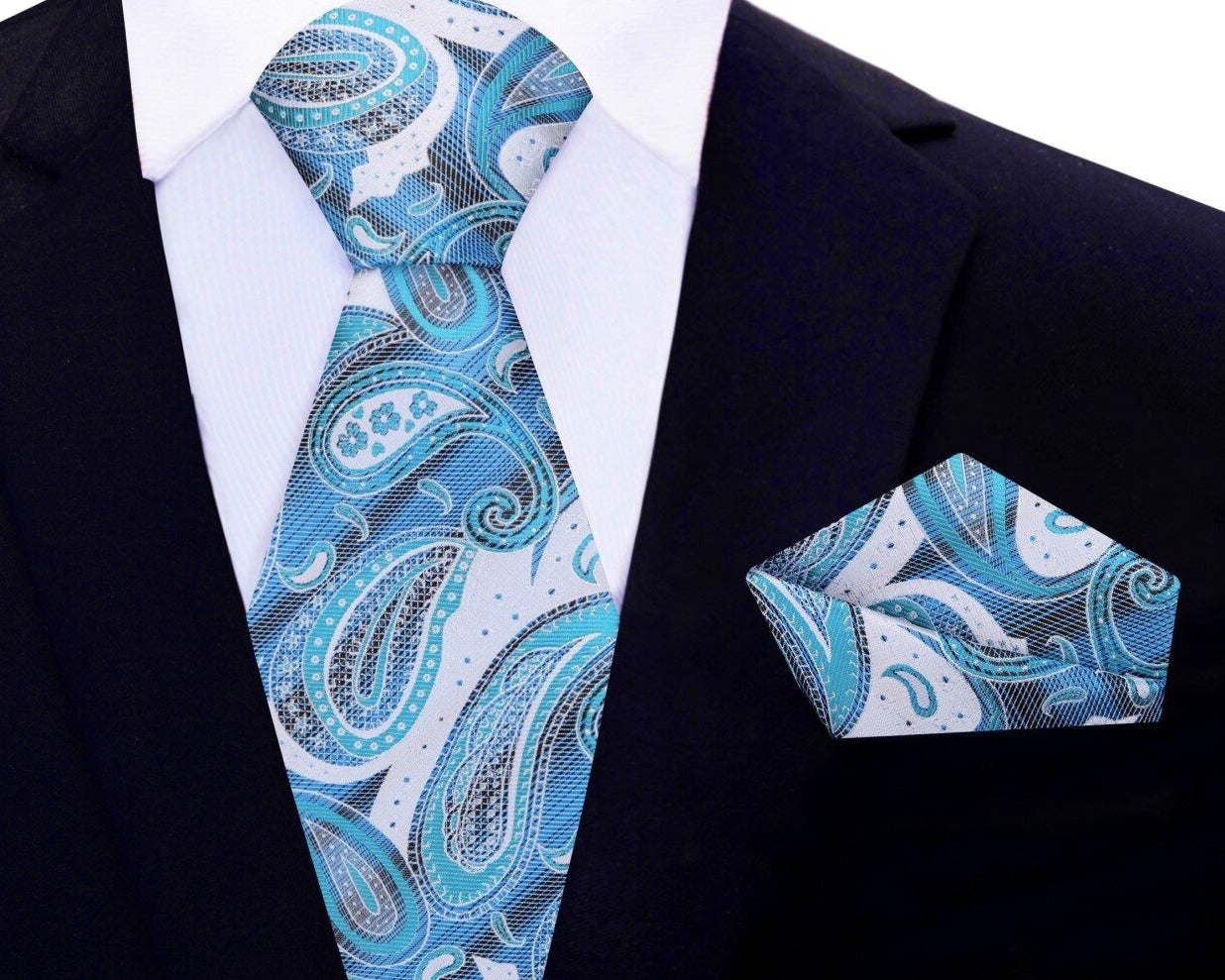 Silk necktie styled with a white dress shirt and gray suit for a wedding