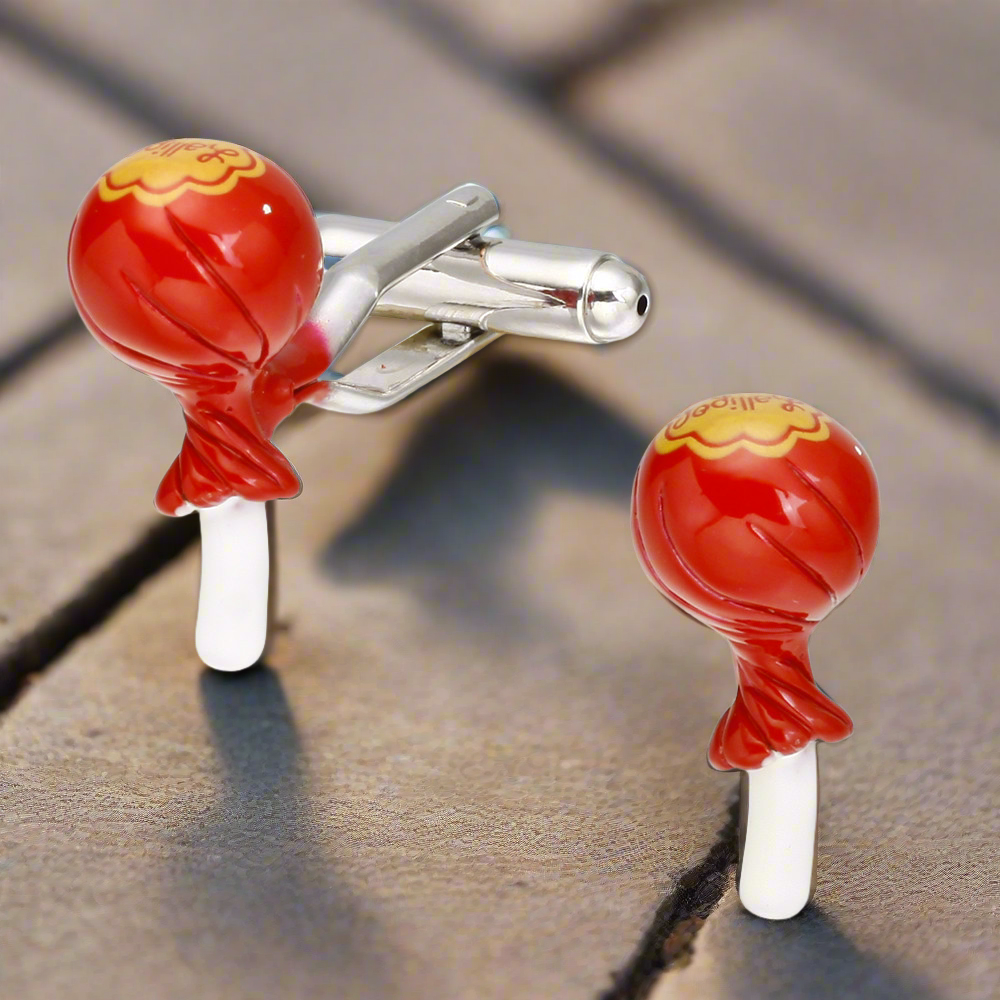 Close-up of whimsical lollipop cufflinks in vibrant colors, showcasing their unique design.
