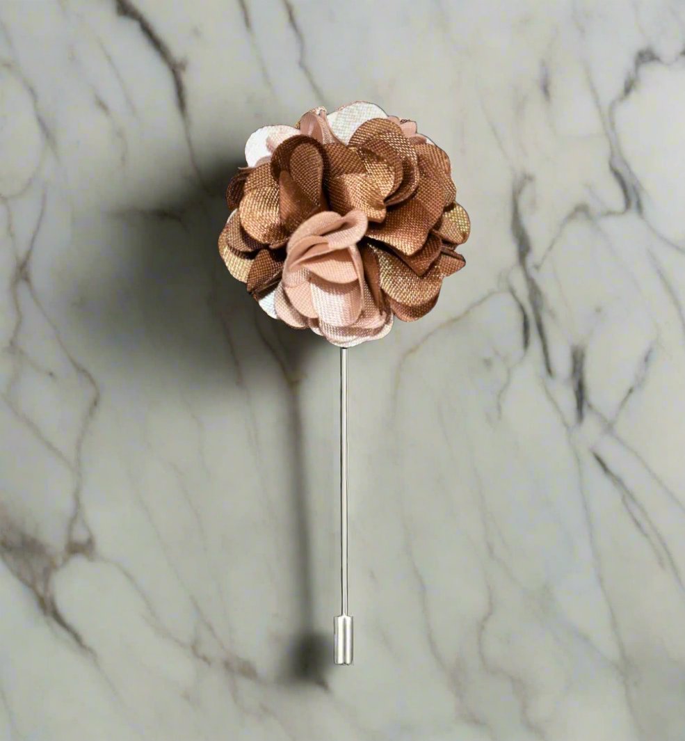 Model wearing large leaf lapel pin for coats, demonstrating style and versatility
