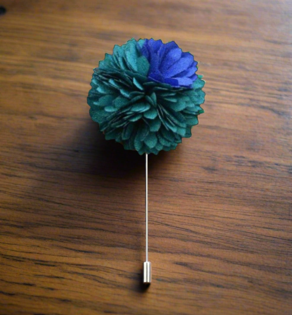 Variety of colorful lapel pins displayed, featuring unique designs in vibrant shades.