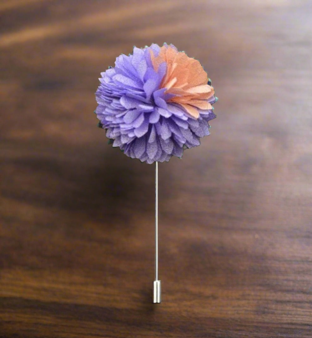Elegant flower lapel pin on a tailored suit jacket, highlighting its stylish appeal.