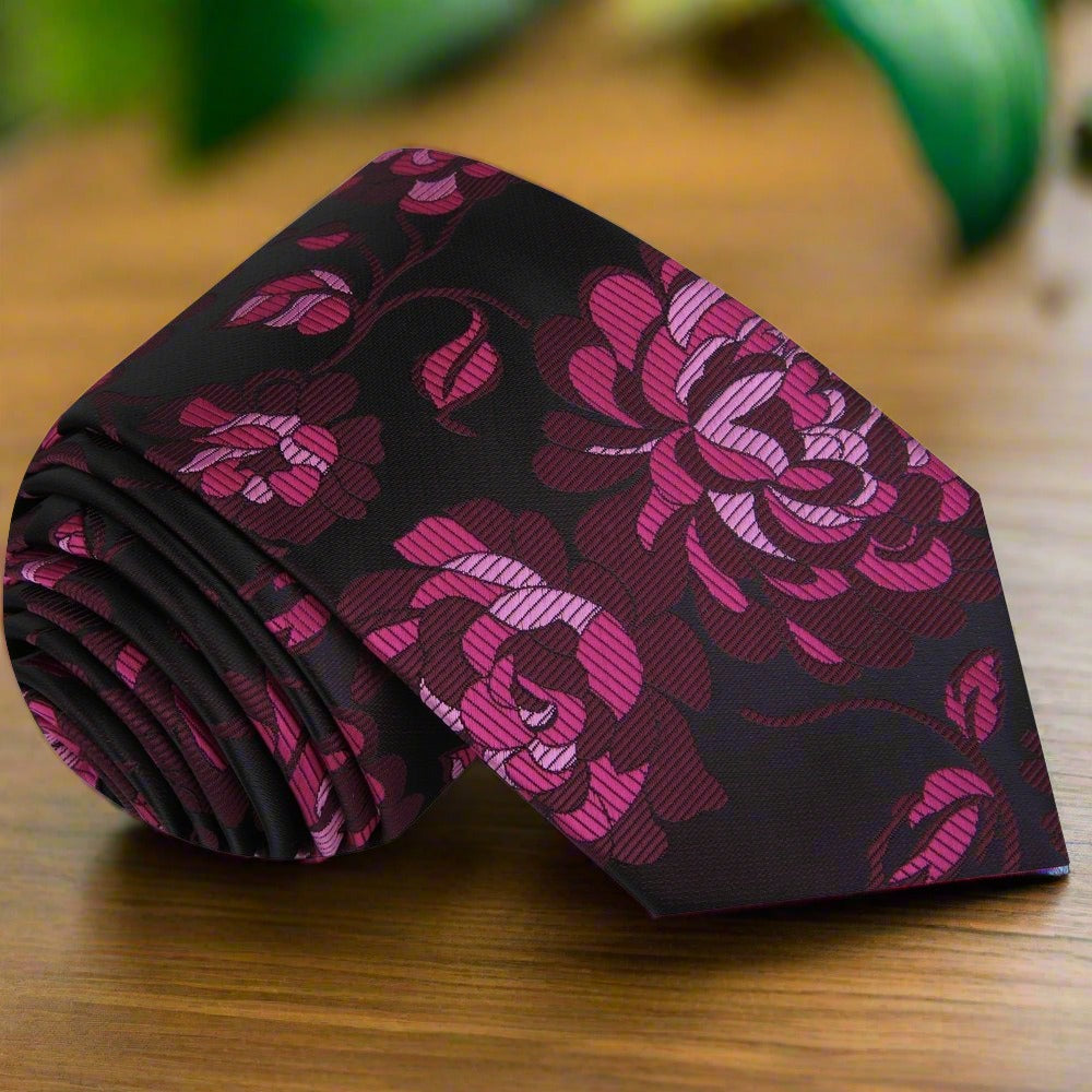 Close-up of silk tie with floral pattern and matching pocket square for formal wear