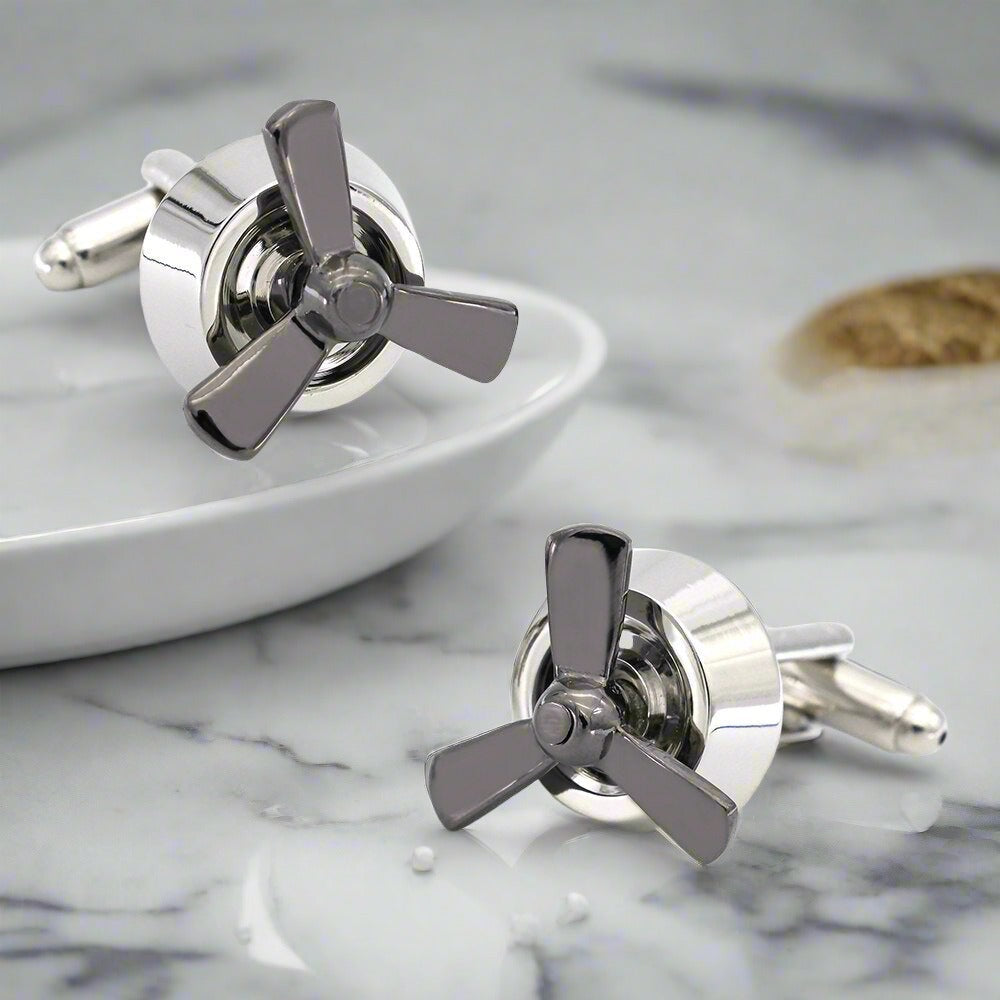 Front view of airplane propeller cufflinks showcasing their stylish design