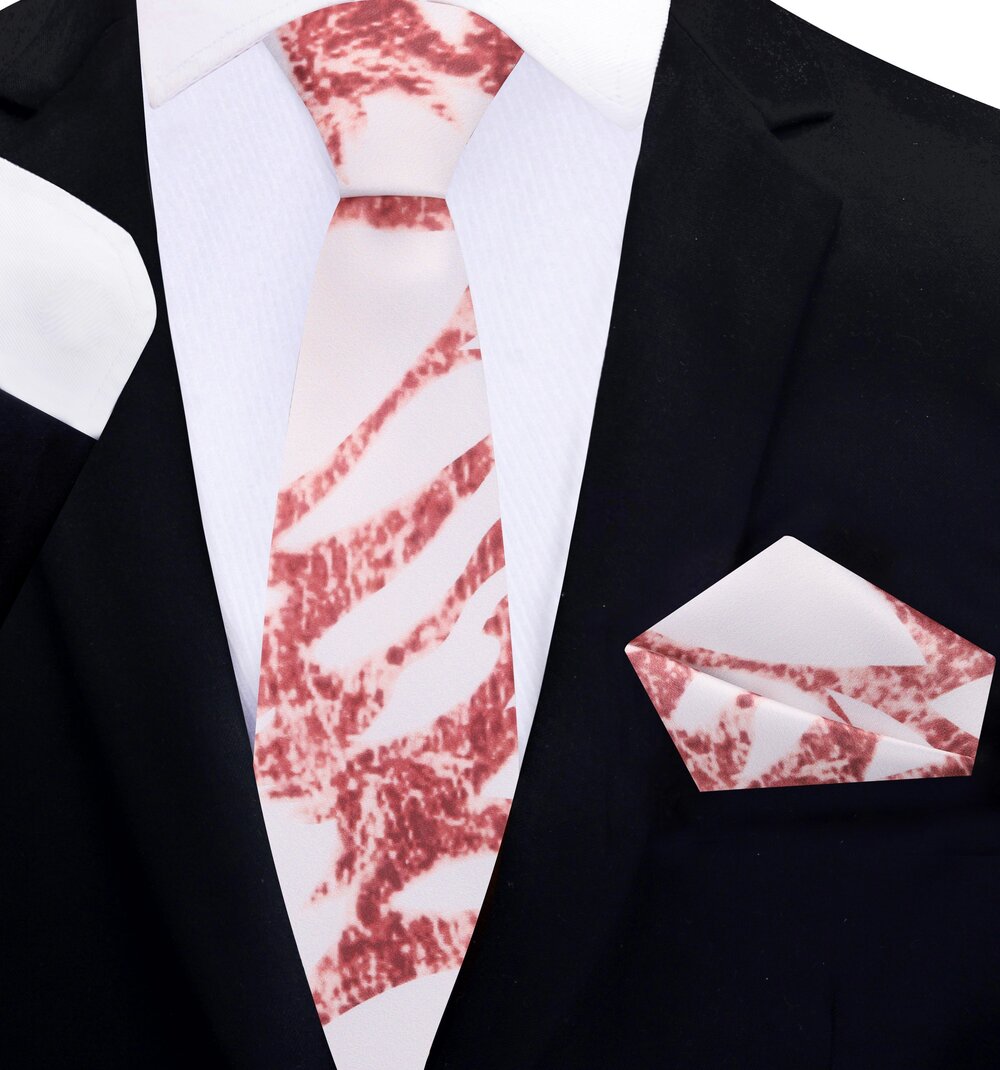 Close-up of rose gold marble tie on white shirt—highlighting silk texture and shimmer