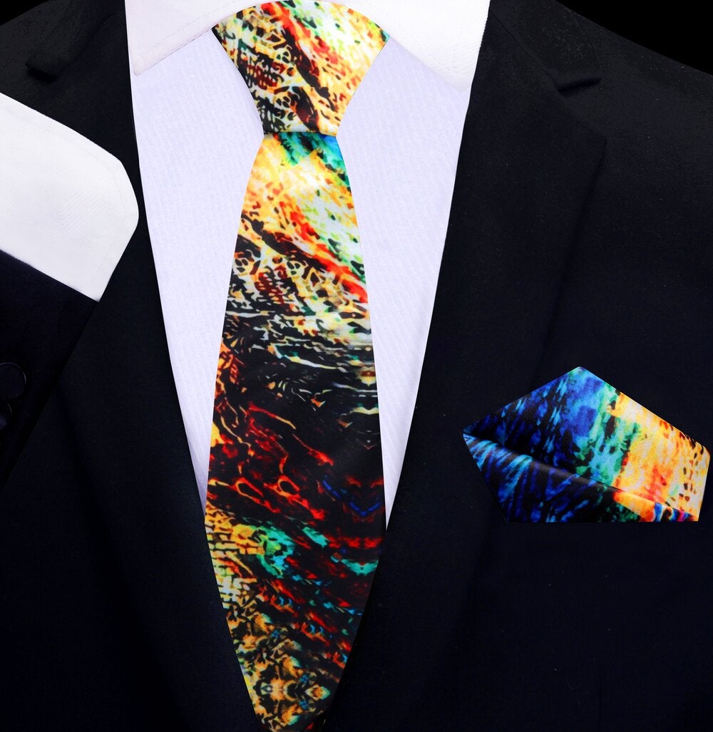 Stylish gentleman wearing a watercolor tie at a formal event, demonstrating versatile fashion.