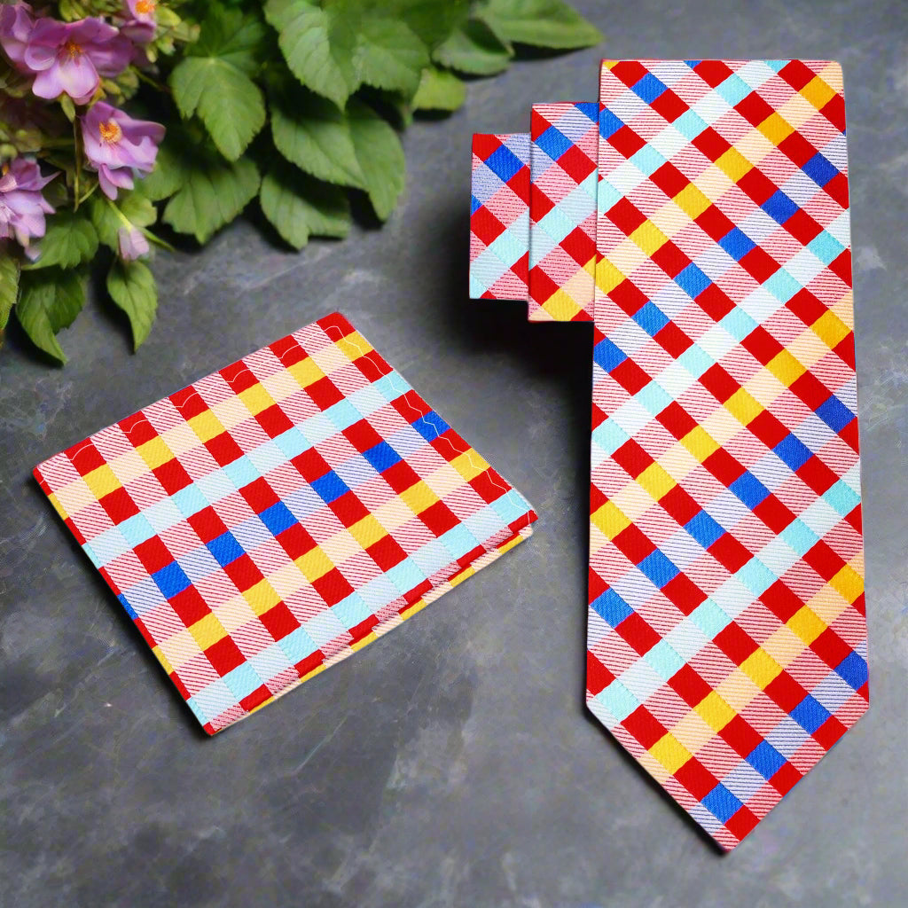 Man wearing a colorful silk necktie with check pattern at a summer wedding